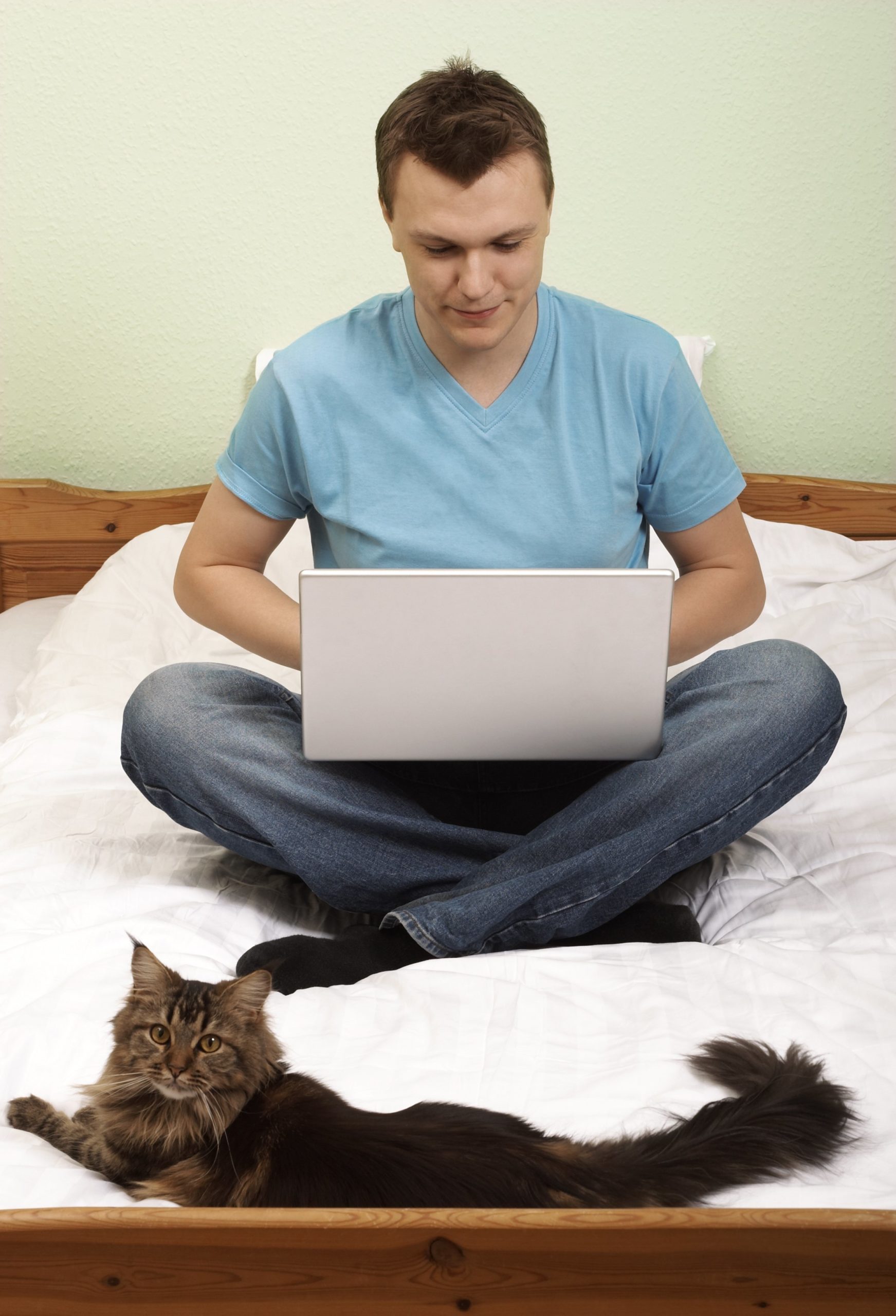 man with laptop and cat.