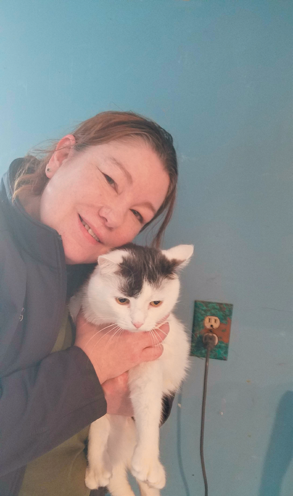 Tufts veterinary technician Michelle Damon had to re-teach her cat, Yeti, to take a pill.
